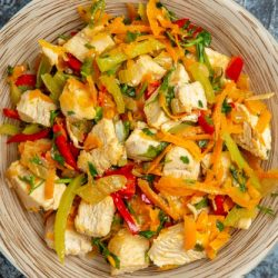 top-view-chicken-salad-with-vegetables-light-surface_140725-75108
